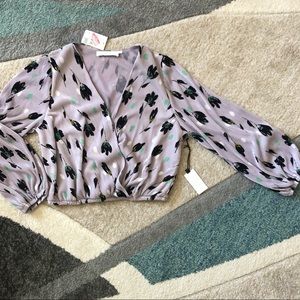Surplus V-neck blouse with puff long sleeves